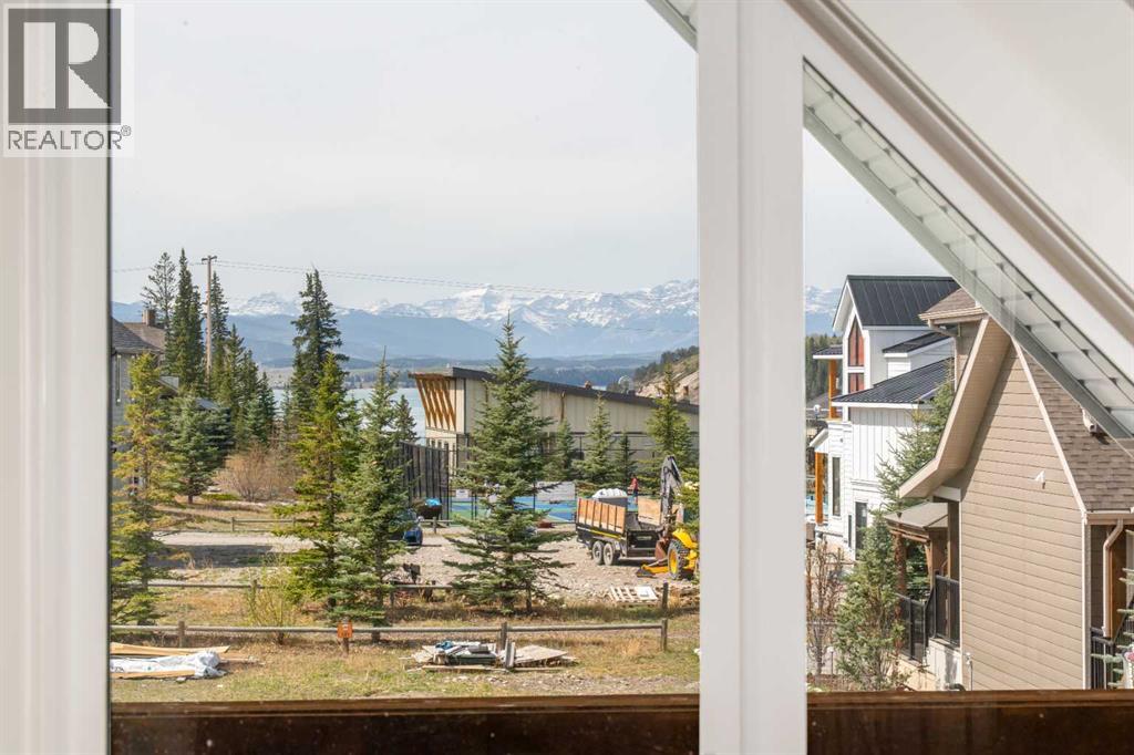 306 Cottageclub Link, Rural Rocky View County, Alberta  T4C 1B1 - Photo 20 - A2296125