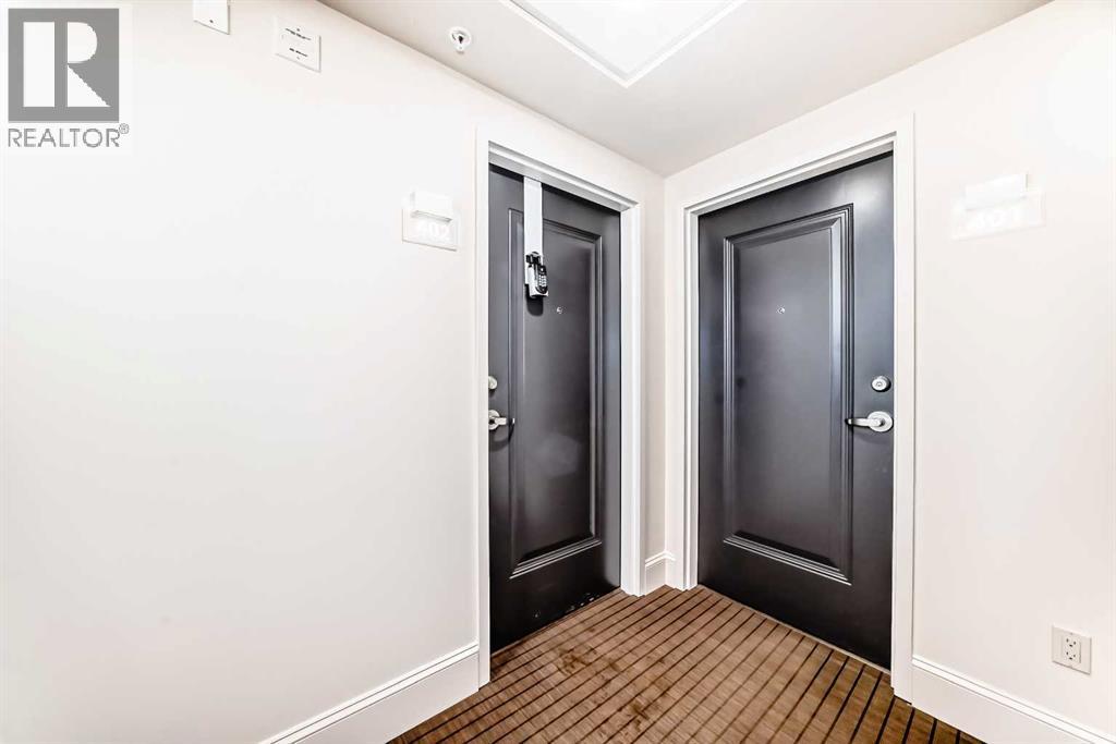 402, 211 Quarry Way SE, Calgary, Alberta  T2C 5M6 - Photo 5 - A2298392