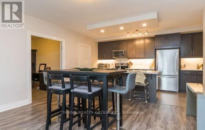 707 - 260 Villagewalk Boulevard, London North, Ontario  N6G 0W6 - Photo 6 - X12955018