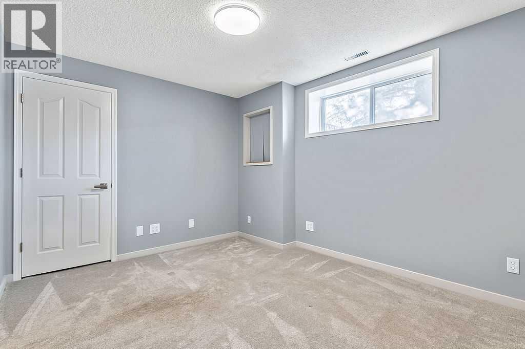 303 Schubert Place NW, Calgary, Alberta  T3L 1X2 - Photo 36 - A2292689