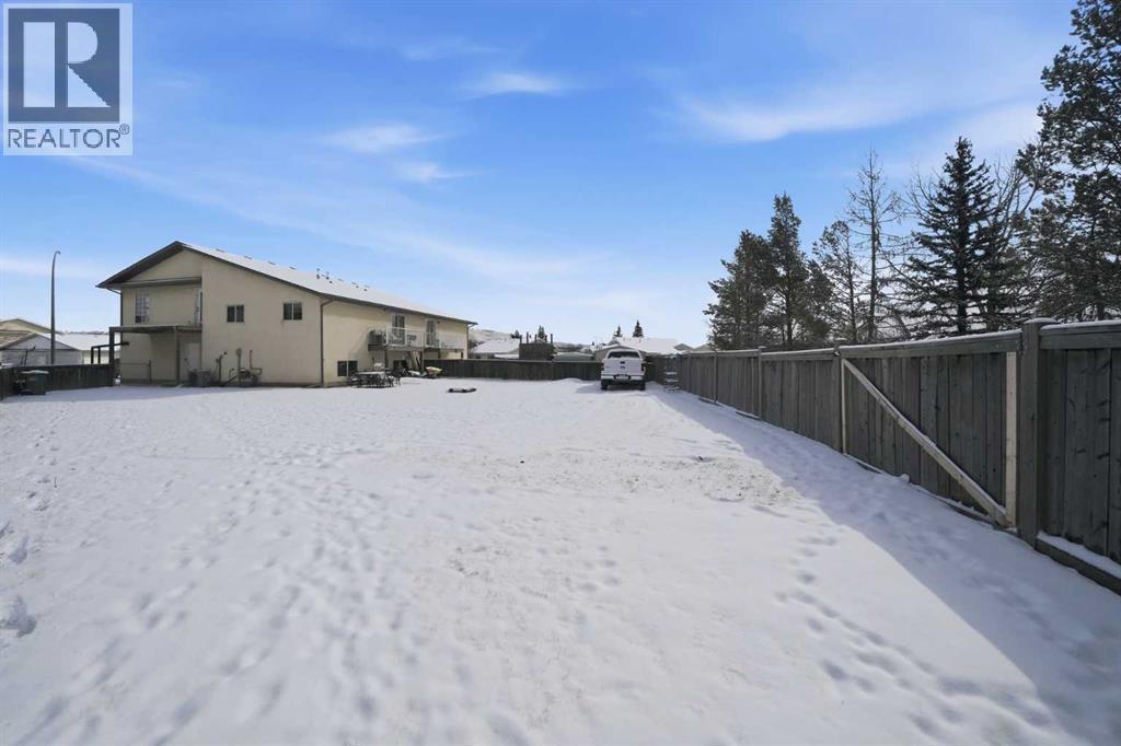 18 West Mcdonald Place, Cochrane, Alberta  T4C 1L8 - Photo 24 - A2297286