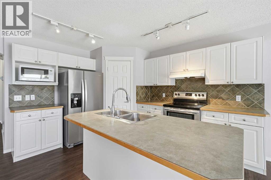 1076 Cranston Drive SE, Calgary, Alberta  T3M 1A4 - Photo 8 - A2291177