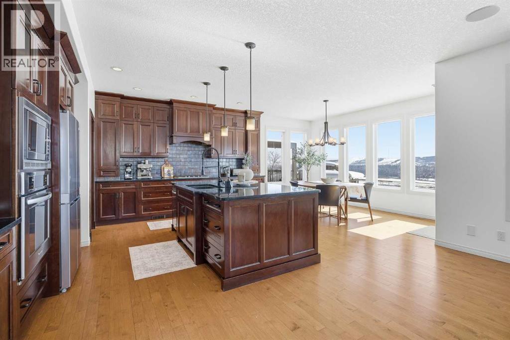 339 Tuscany Estates Rise NW, Calgary, Alberta  T3L 0C6 - Photo 11 - A2297189