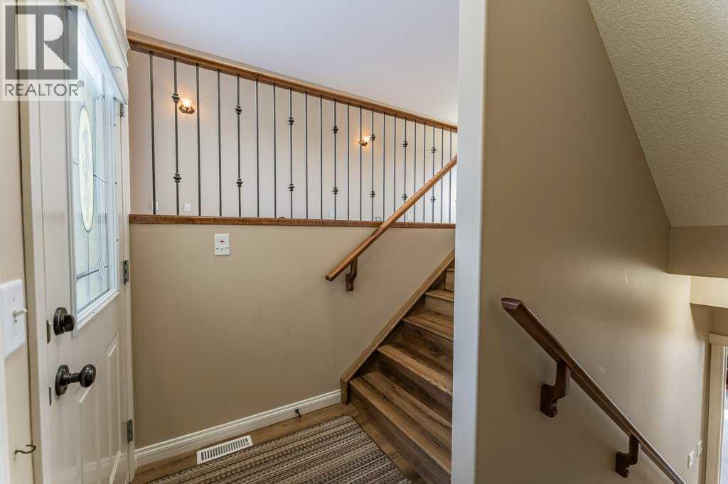 1008 Highland Green Drive NW, High River, Alberta  T1V 1V8 - Photo 2 - A2285885