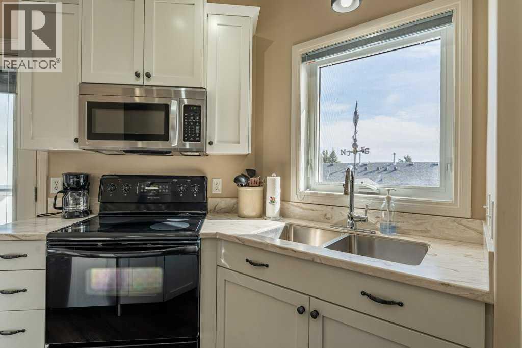 1008 Highland Green Drive NW, High River, Alberta  T1V 1V8 - Photo 13 - A2285885