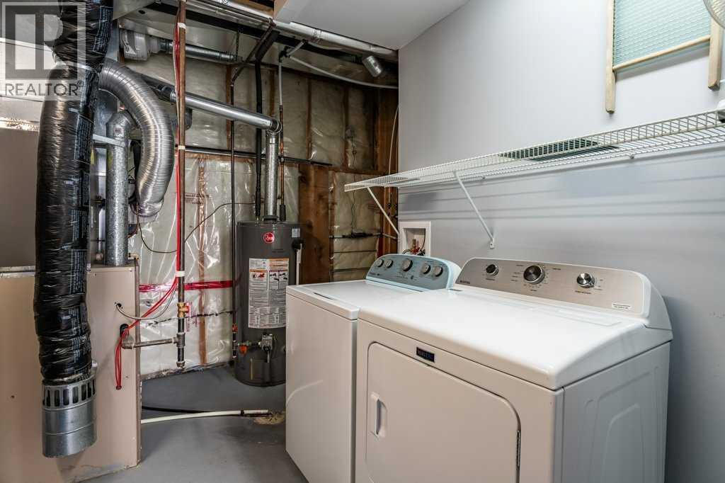 1008 Highland Green Drive NW, High River, Alberta  T1V 1V8 - Photo 39 - A2285885