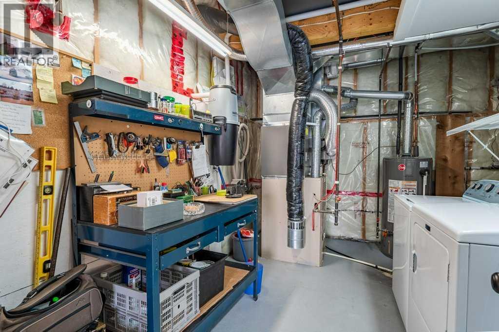 1008 Highland Green Drive NW, High River, Alberta  T1V 1V8 - Photo 38 - A2285885