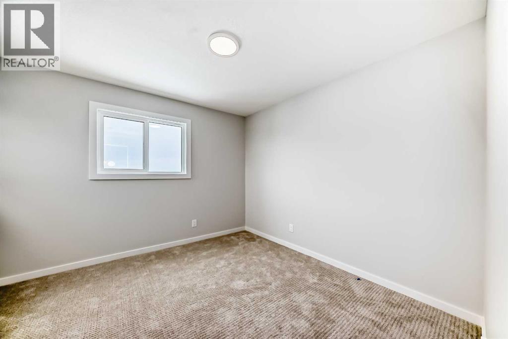 203 Langwell Common Se, Airdrie, Alberta  T4A 3R4 - Photo 38 - A2295682