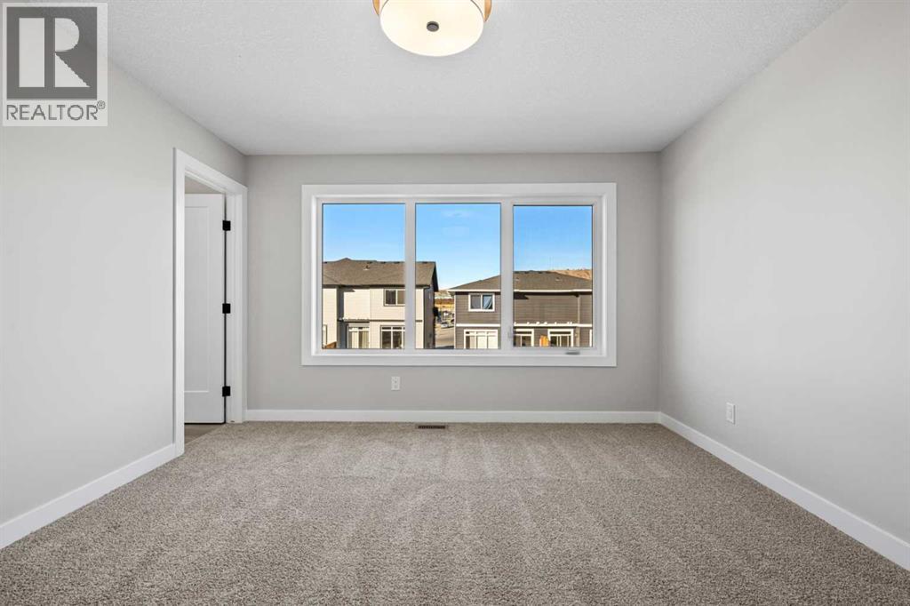 85 Quartz Crescent, Cochrane, Alberta  T4C 3G2 - Photo 20 - A2282373