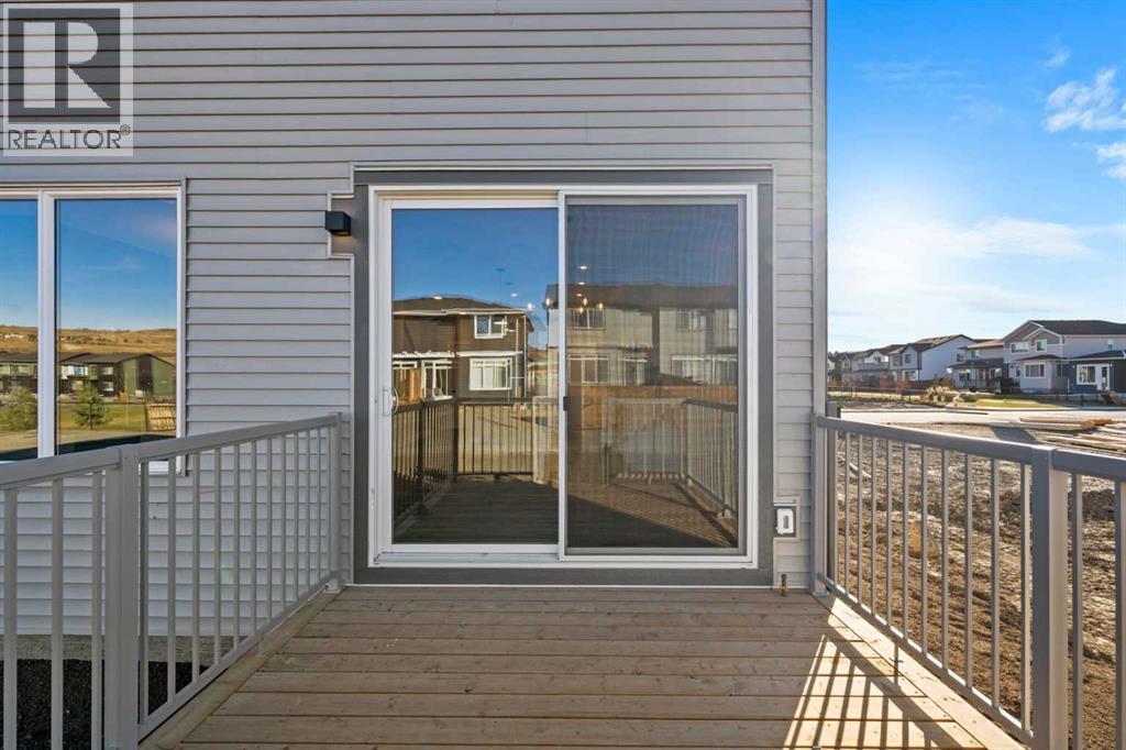 85 Quartz Crescent, Cochrane, Alberta  T4C 3G2 - Photo 35 - A2282373