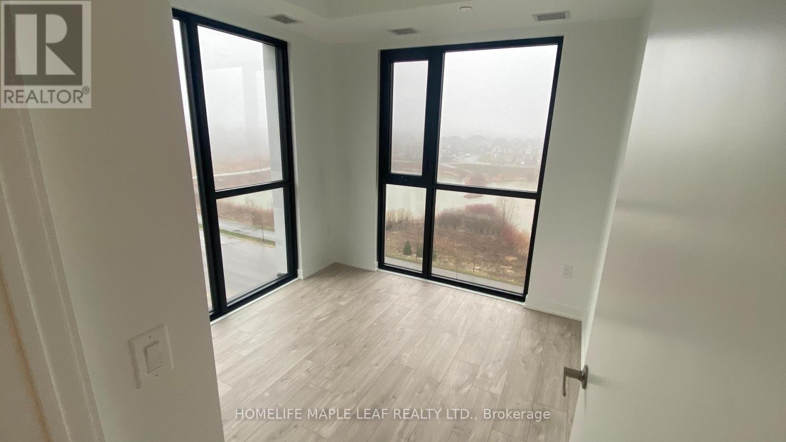 512 - 720 Whitlock Avenue E, Milton, Ontario  L9E 2B5 - Photo 4 - W12955360