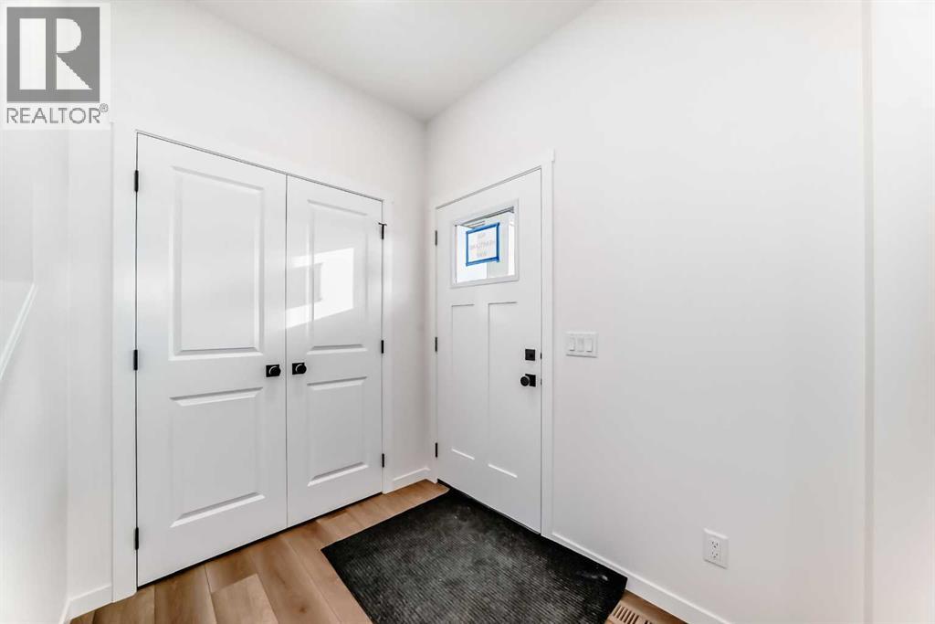 406 Heartland Way, Cochrane, Alberta  T4C 3E5 - Photo 2 - A2267807