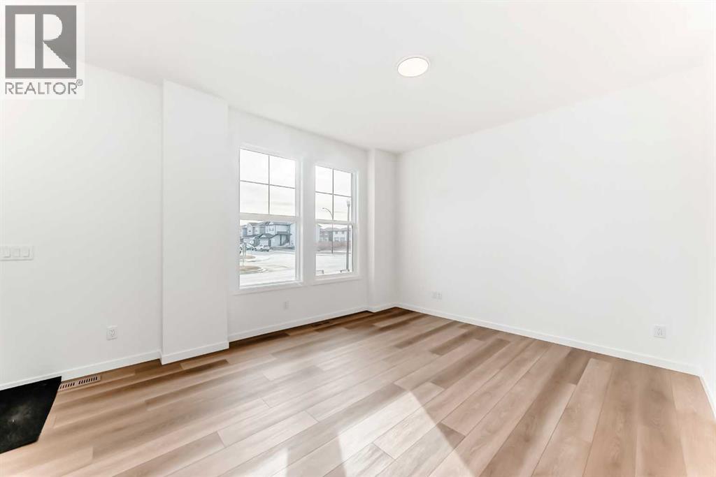 406 Heartland Way, Cochrane, Alberta  T4C 3E5 - Photo 8 - A2267807