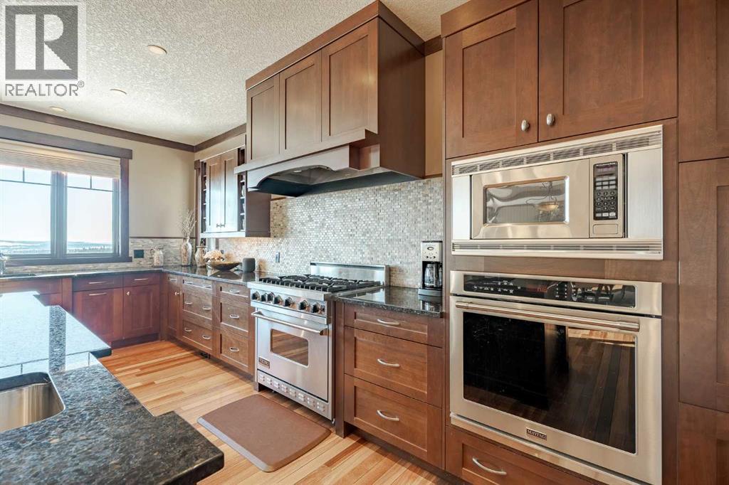 126 Hawk's Landing Drive, Priddis Greens, Alberta  T0L 1W3 - Photo 19 - A2280924