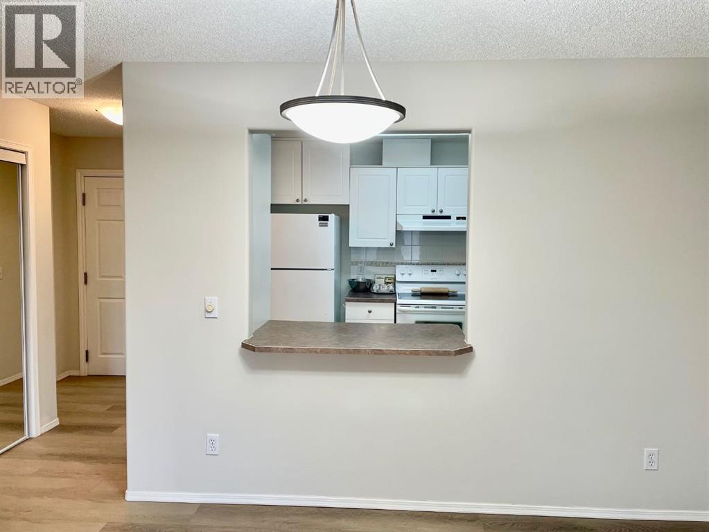 1207, 928 Arbour Lake Road NW, Calgary, Alberta  T3G 5T2 - Photo 6 - A2277589