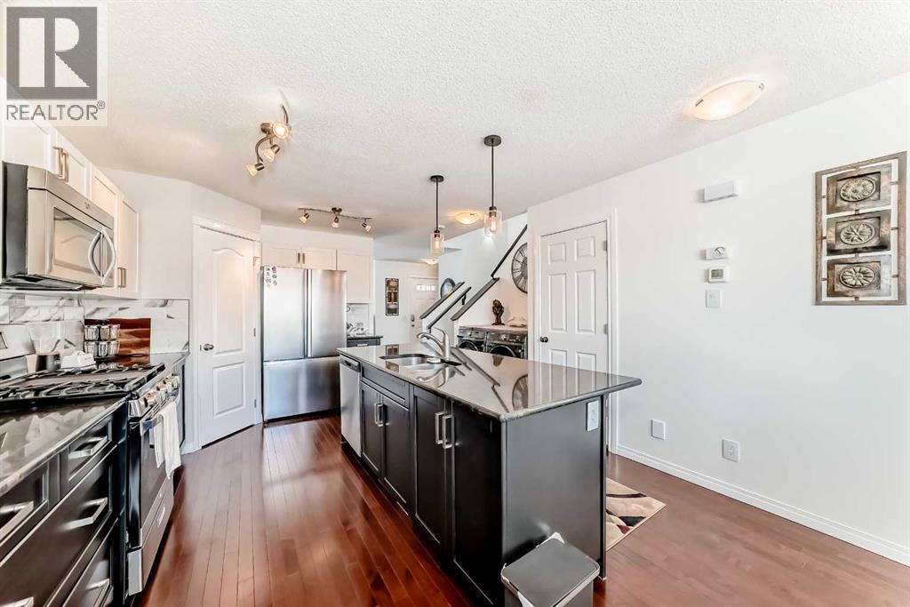 1264 Reunion Place Nw, Airdrie, Alberta  T4B 0M4 - Photo 6 - A2295646