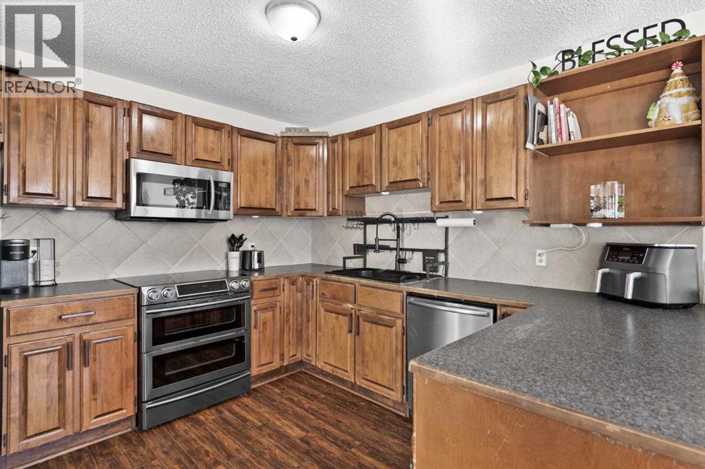 66 Elston Place SE, Airdrie, Alberta  T4B 1B3 - Photo 11 - A2296443