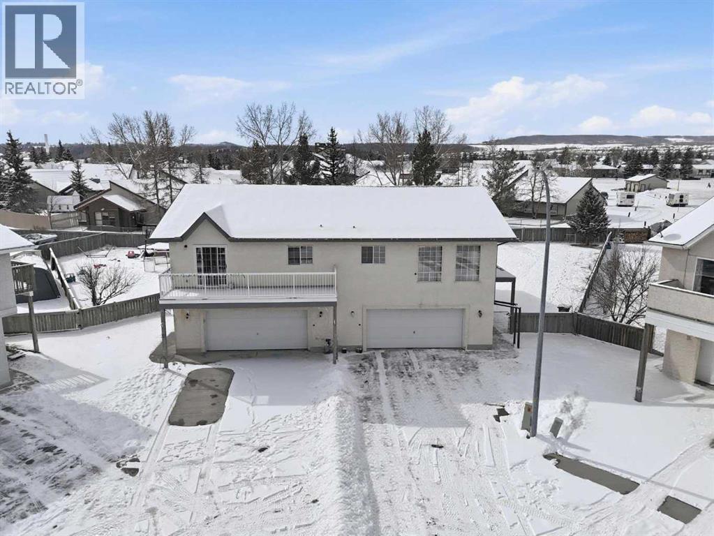 18 West Mcdonald Place, Cochrane, Alberta  T4C 1L8 - Photo 3 - A2297286