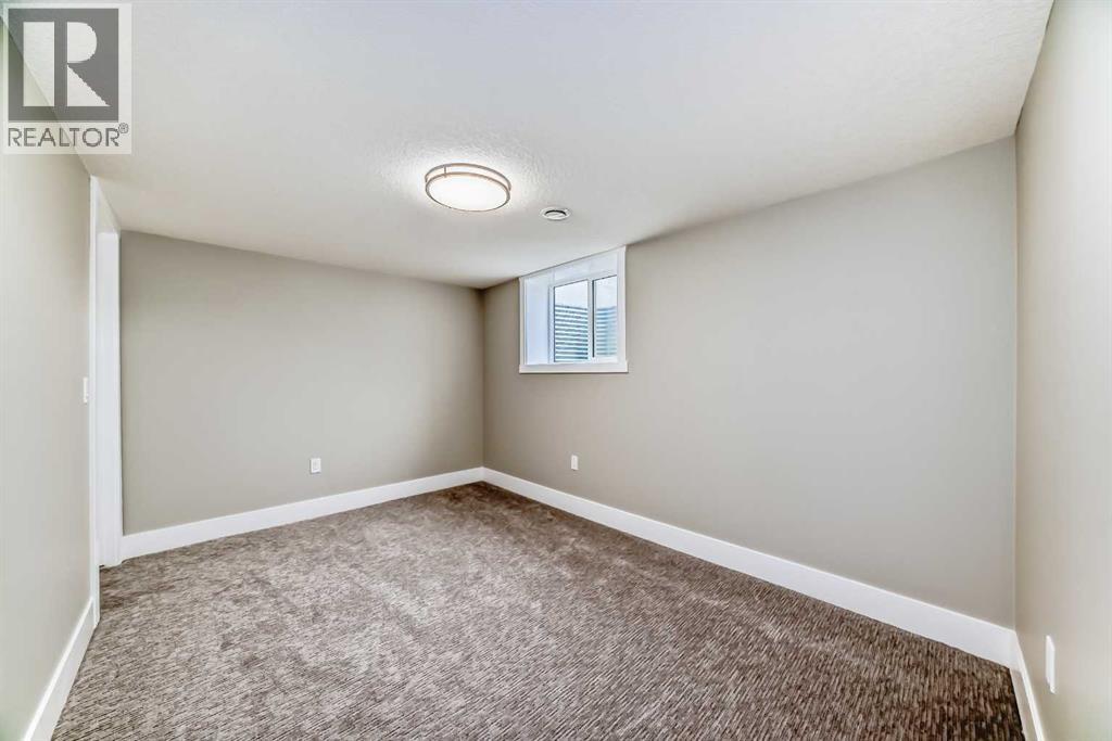 1256 Lake Twintree Drive Se, Calgary, Alberta  T2J 2T2 - Photo 34 - A2296481