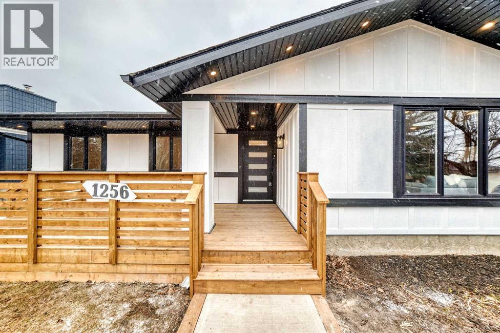 1256 Lake Twintree Drive Se, Calgary, Alberta  T2J 2T2 - Photo 2 - A2296481