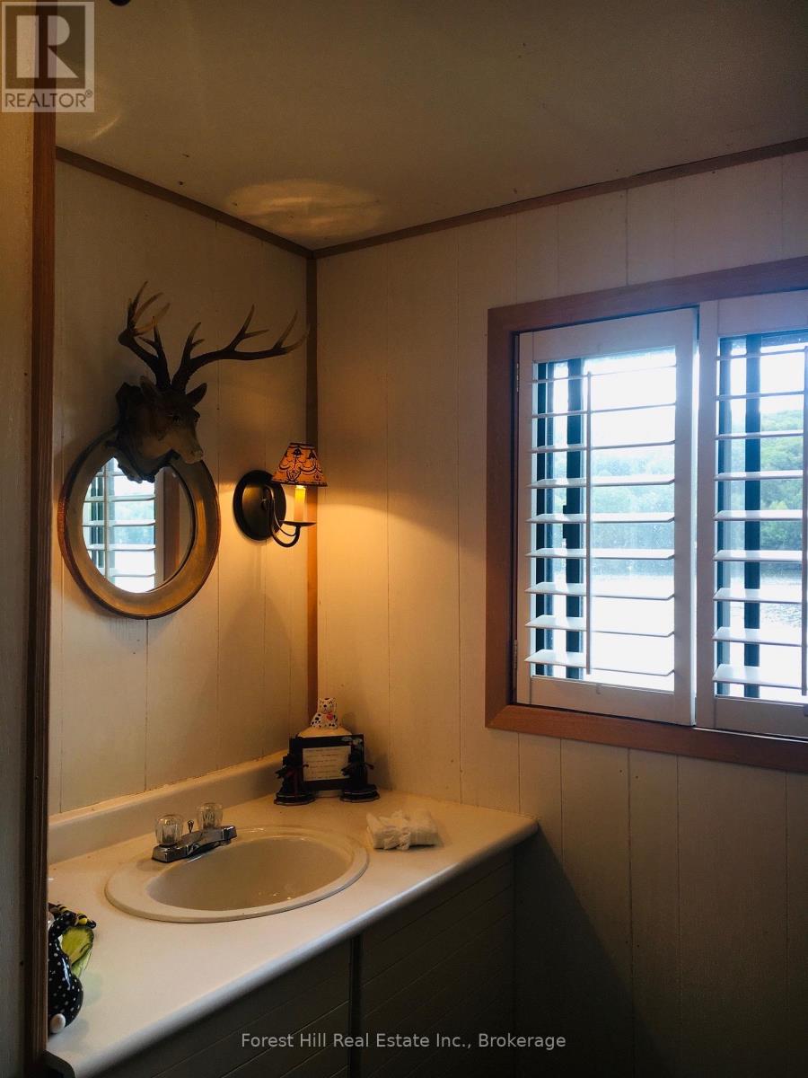 1187 Ivy Lane, Algonquin Highlands, Ontario  P0A 1E0 - Photo 23 - X12922028