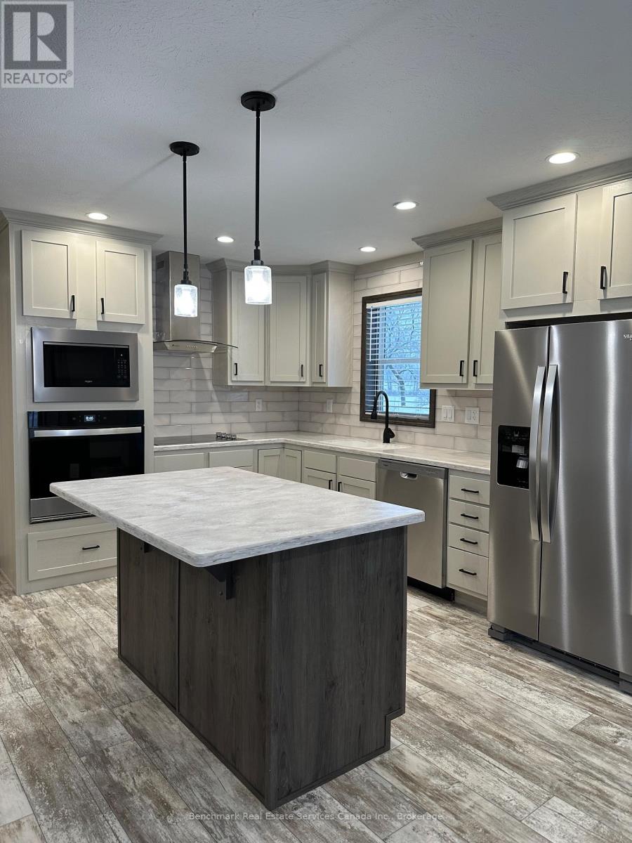 210 Spruce Drive, West Grey, Ontario N4N 3B8 - Photo 3 - X12955696