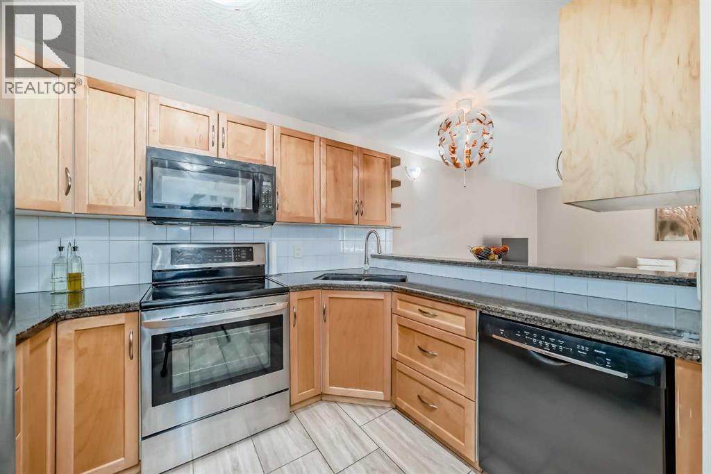 103, 26 Glamis Green SW, Calgary, Alberta  T3E 6V1 - Photo 10 - A2295598