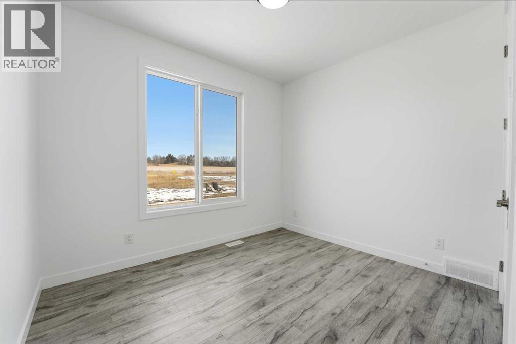 4240 Bauman Way, Innisfail, Alberta  T4G 0P1 - Photo 6 - A2296823