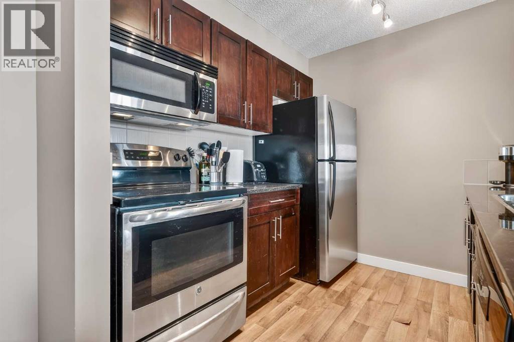 4317, 403 Mackenzie Way Sw, Airdrie, Alberta  T4B 3V7 - Photo 3 - A2298434