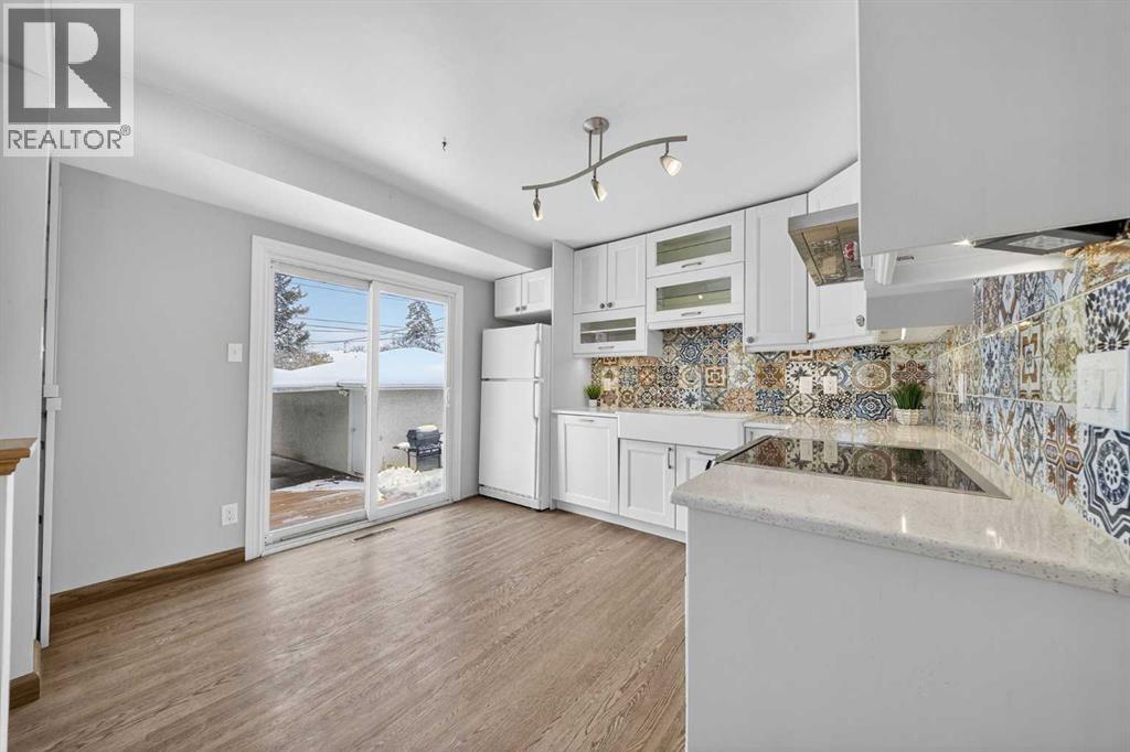 23 Hyslop Drive SW, Calgary, Alberta  T2V 3A2 - Photo 8 - A2298506