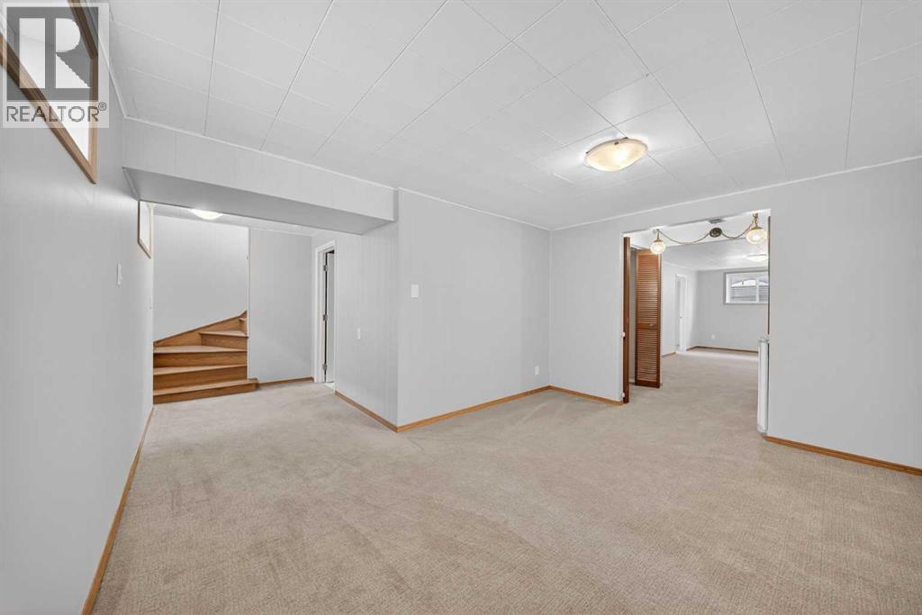 23 Hyslop Drive SW, Calgary, Alberta  T2V 3A2 - Photo 25 - A2298506