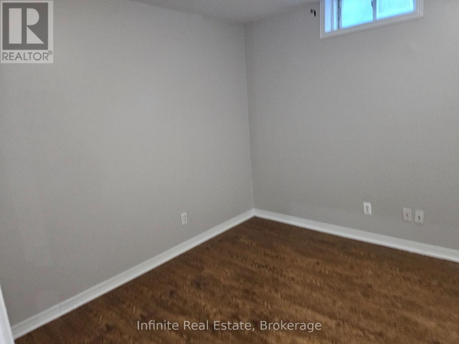 345 Queen Mary Drive, Brampton, Ontario  L7A 3S7 - Photo 7 - W12690010