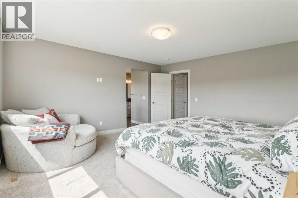 128 Sundown View, Cochrane, Alberta  T4C 2N9 - Photo 19 - A2298637