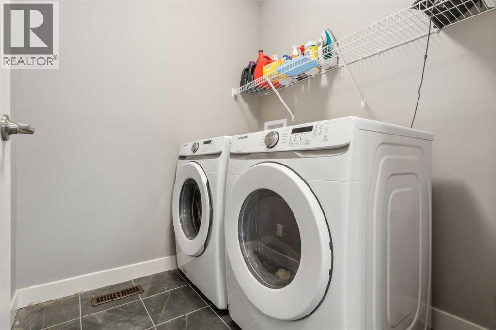 128 Sundown View, Cochrane, Alberta  T4C 2N9 - Photo 28 - A2298637