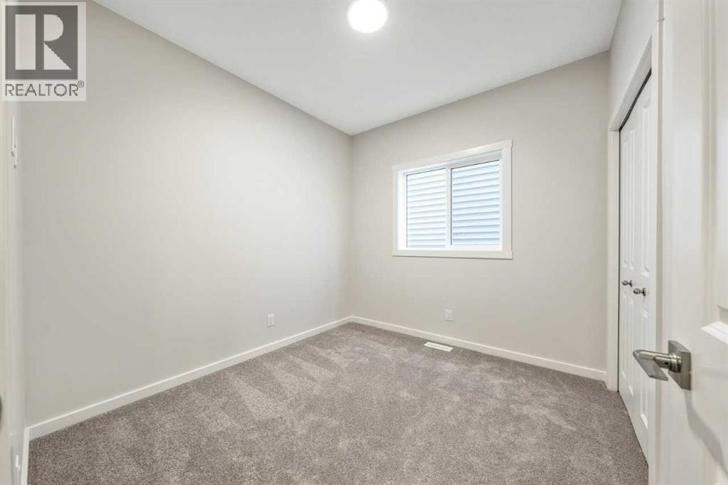 412 Heartwood Grove W, Calgary, Alberta  T2X 0T9 - Photo 14 - A2298163