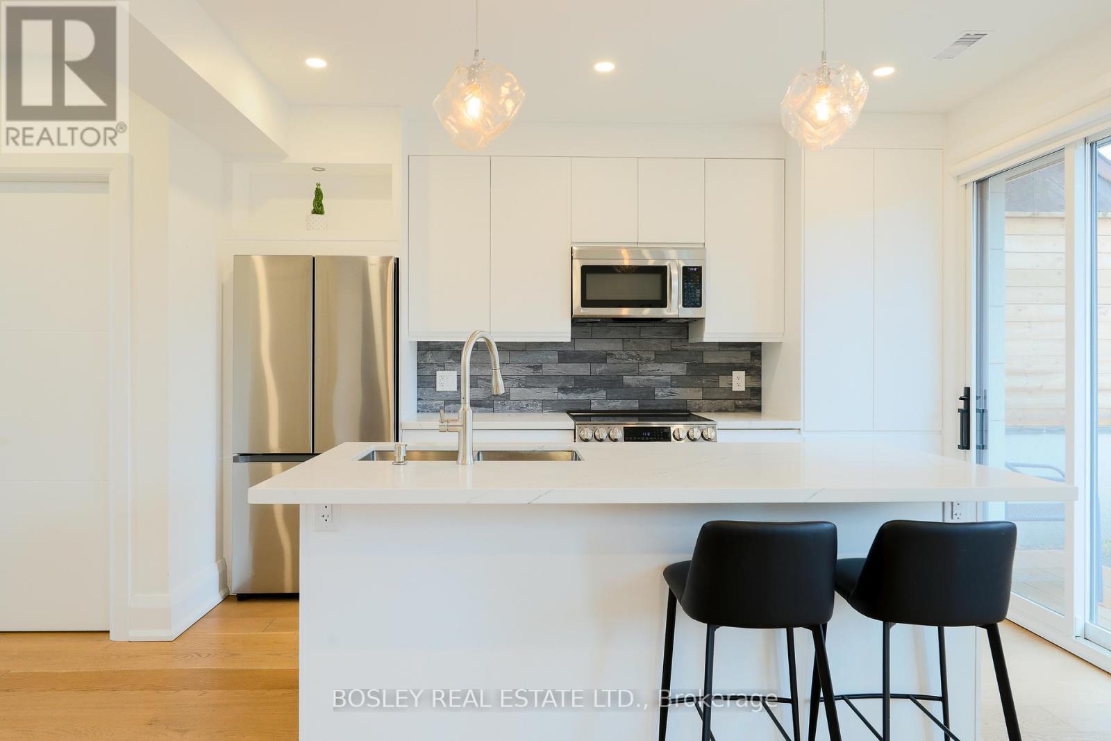 Rear - 108 Moberly Avenue, Toronto, Ontario  M4C 4B1 - Photo 8 - E12944014