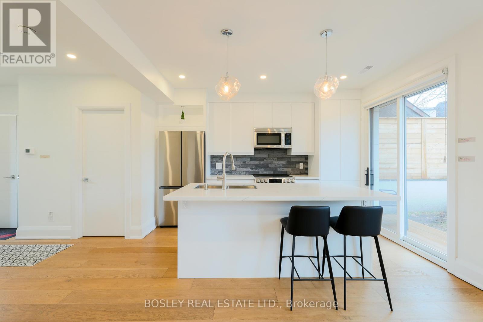 Rear - 108 Moberly Avenue, Toronto, Ontario  M4C 4B1 - Photo 7 - E12944014