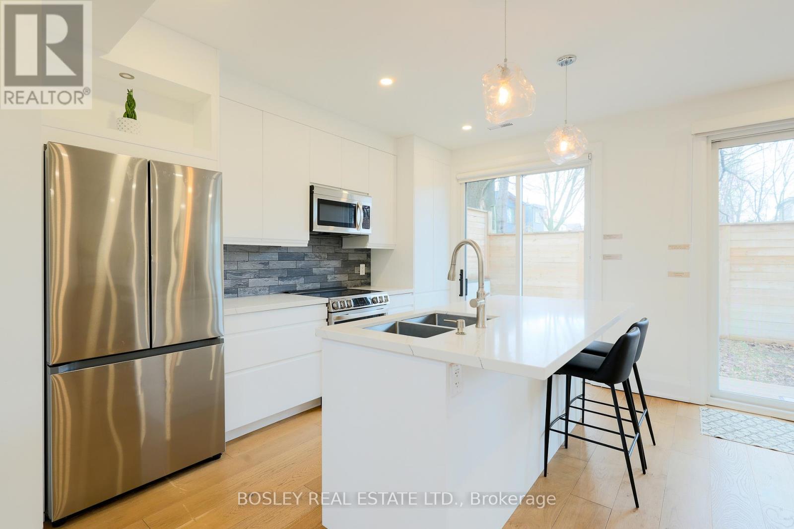 Rear - 108 Moberly Avenue, Toronto, Ontario  M4C 4B1 - Photo 9 - E12944014