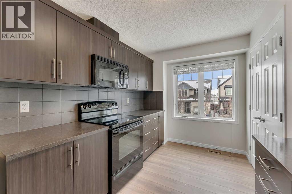 165 Windstone Avenue SW, Airdrie, Alberta  T4B 3R3 - Photo 7 - A2298524