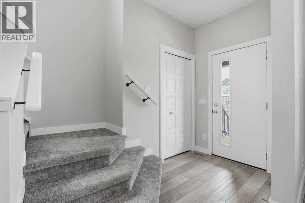 747 Creekside Boulevard SW, Calgary, Alberta  T2X 5H1 - Photo 4 - A2298880