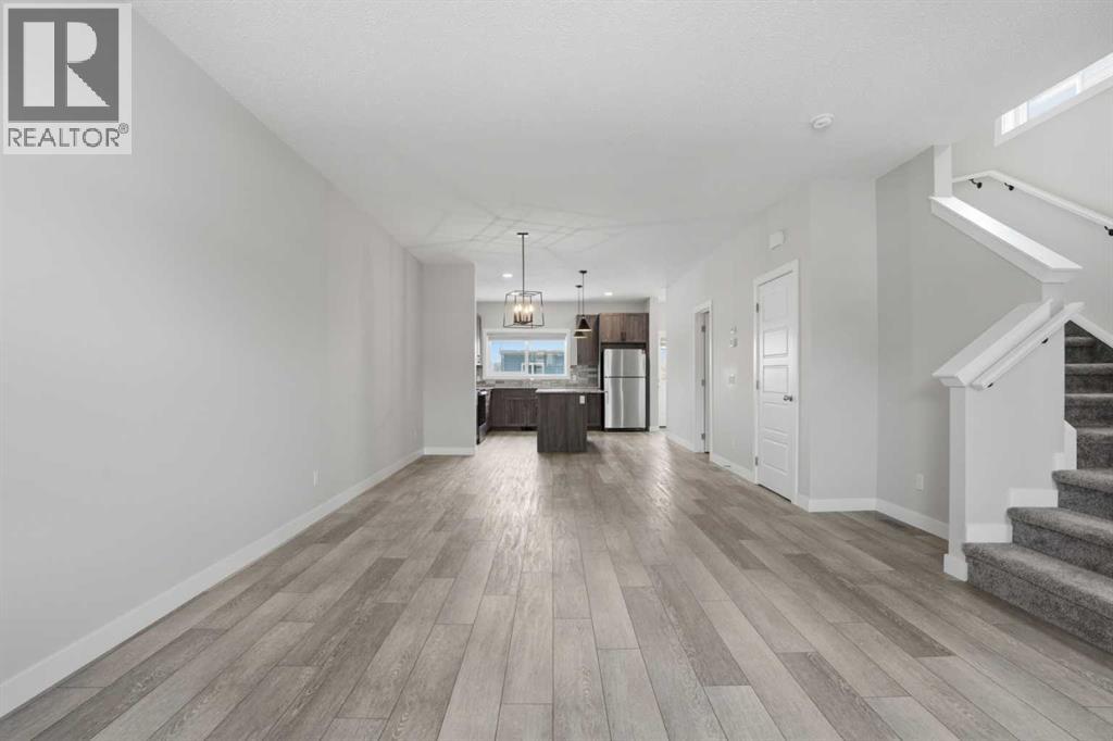 747 Creekside Boulevard SW, Calgary, Alberta  T2X 5H1 - Photo 8 - A2298880