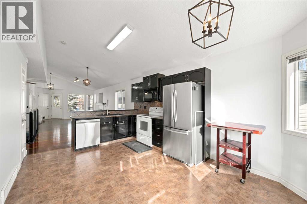 145 Cimarron Grove Circle, Okotoks, Alberta  T1S 2M1 - Photo 9 - A2297989