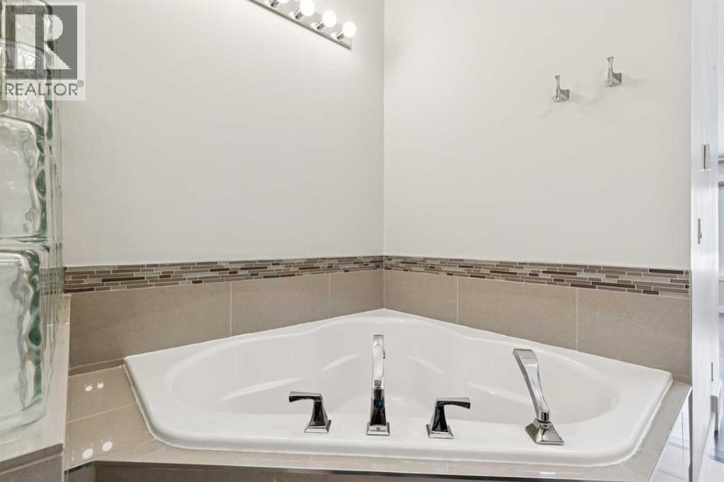 33 Pump Hill Landing SW, Calgary, Alberta  T2V 5C1 - Photo 20 - A2298133