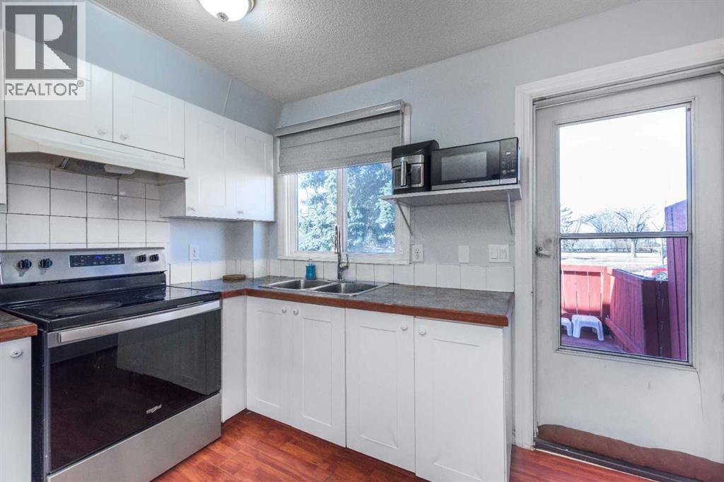 1209 52a Street SE, Calgary, Alberta  T2A 1V2 - Photo 4 - A2295190