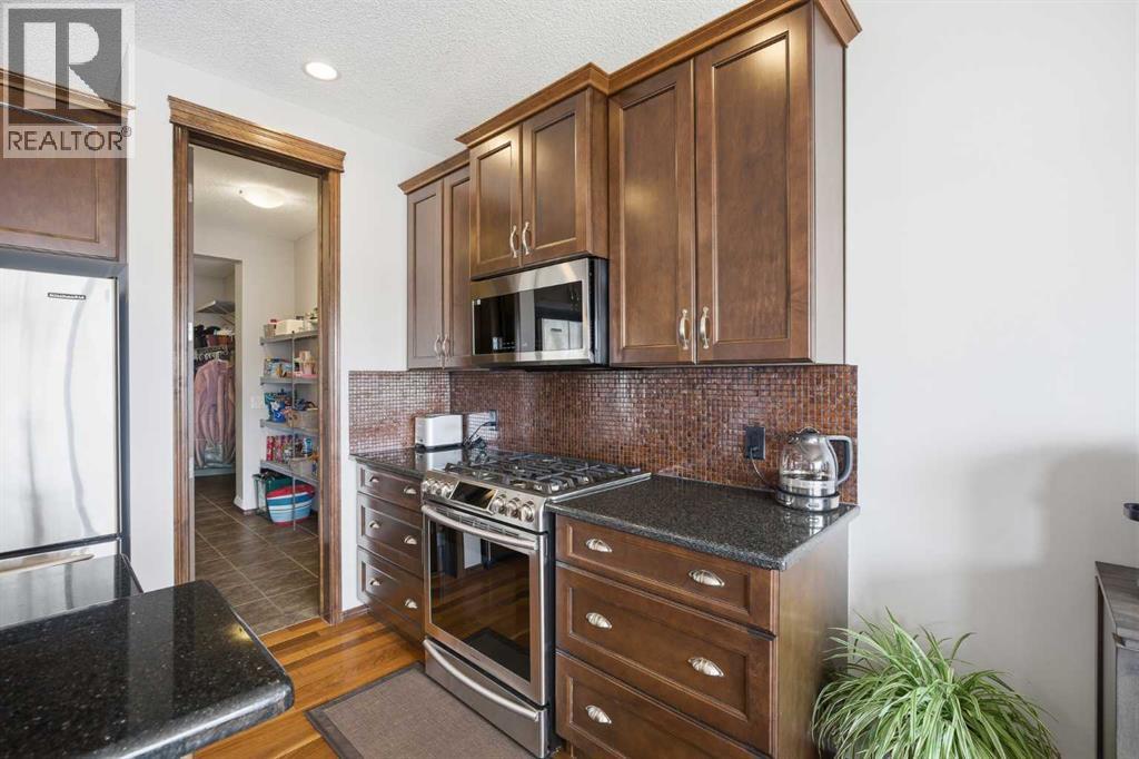 126 Pantego Way NW, Calgary, Alberta  T3K 0K6 - Photo 7 - A2298884