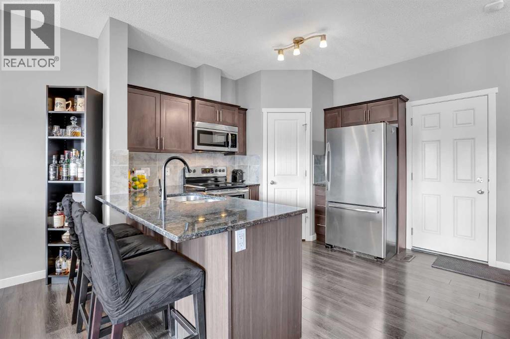 15 Copperpond Landing SE, Calgary, Alberta  T2Z 1G6 - Photo 7 - A2288713