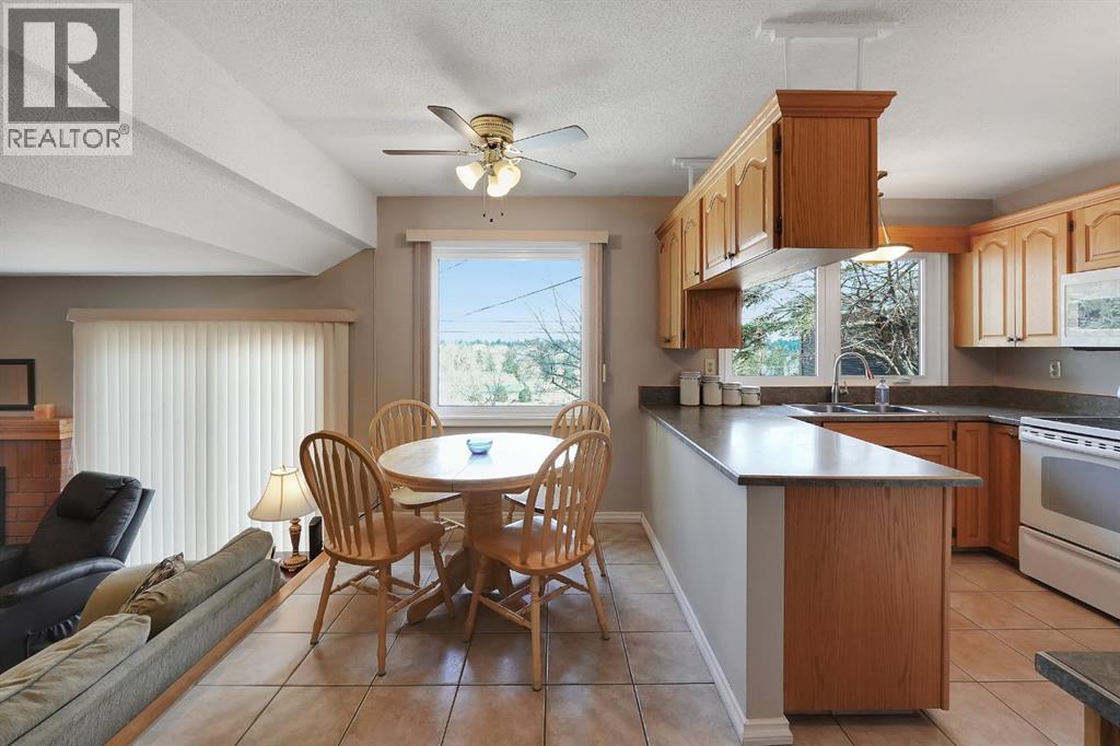 1102 Lake Christina Way SE, Calgary, Alberta  T2J 2R3 - Photo 18 - A2296764