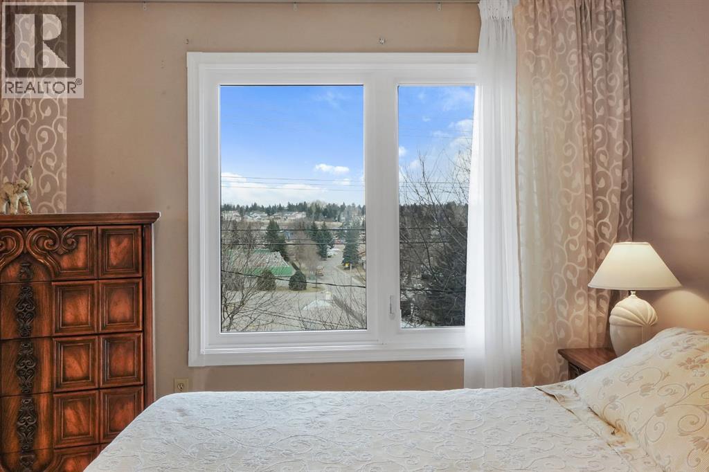 1102 Lake Christina Way SE, Calgary, Alberta  T2J 2R3 - Photo 28 - A2296764