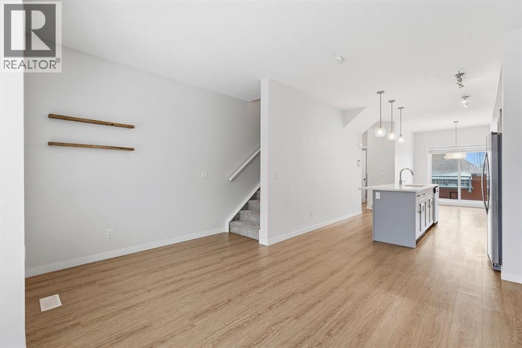 84 Shawnee Common SW, Calgary, Alberta  T2Y 0P9 - Photo 3 - A2278103