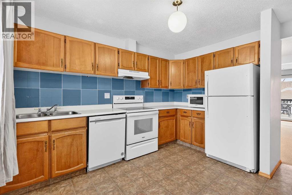 1502 Ranchlands Way NW, Calgary, Alberta  T3G 1R2 - Photo 4 - A2296554